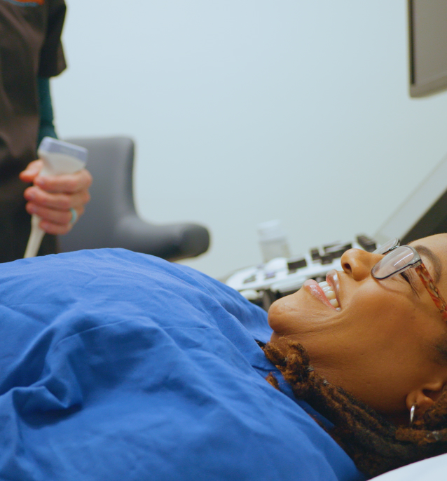 Smiling patient preparing for scan