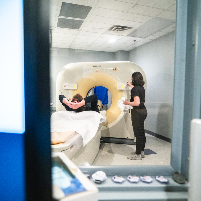 Northwest Radiology tech operating a CT scanner